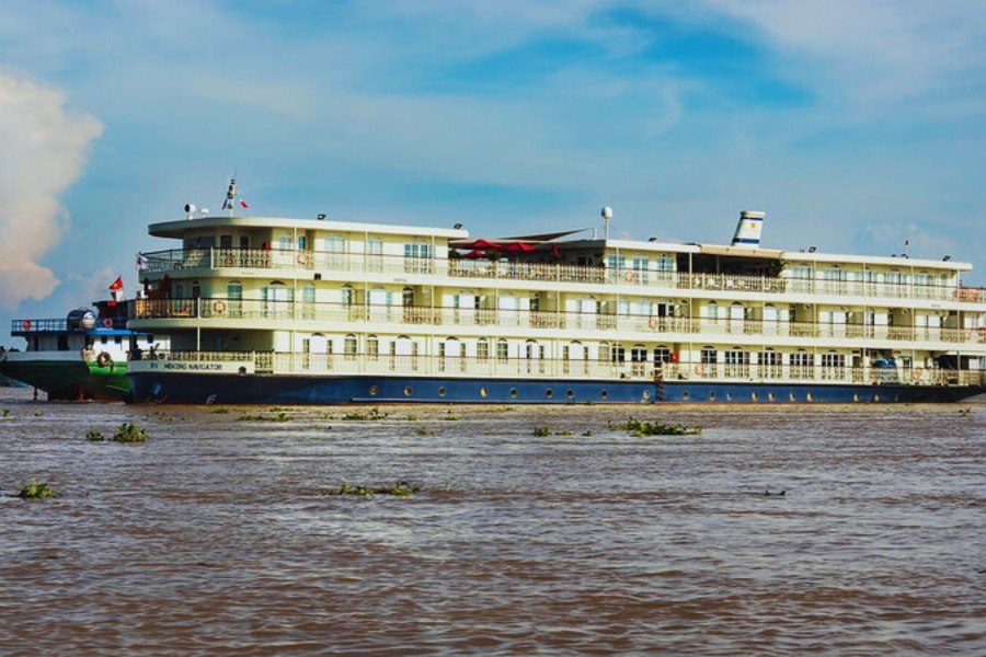 RV Mekong Navigator luxury river cruise sailing through calm waters with Auasia Travel